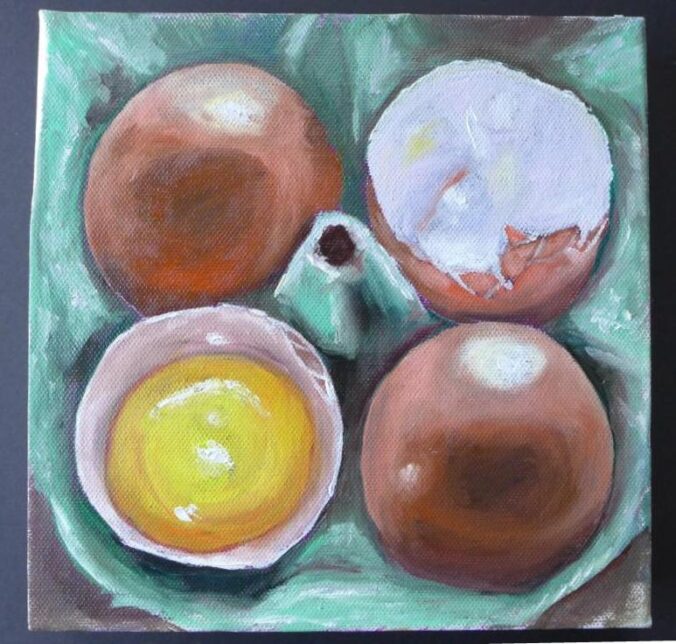 Eierkarton mit vier Eiern